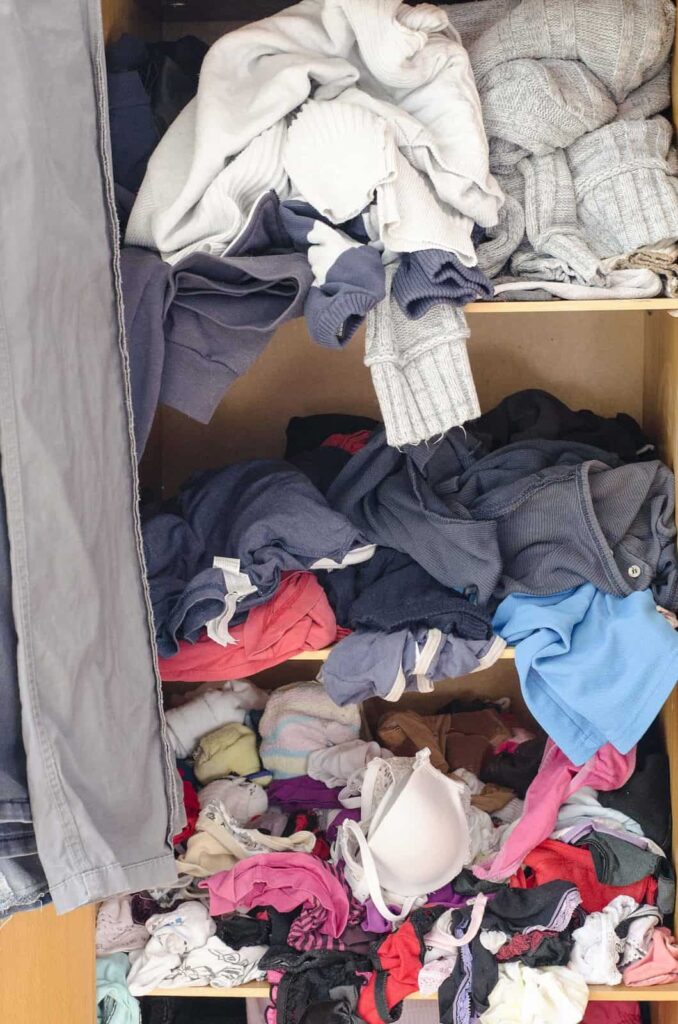 https://180closetdesign.com/wp-content/uploads/2019/02/clothes-falling-out-of-closet-678x1024.jpg